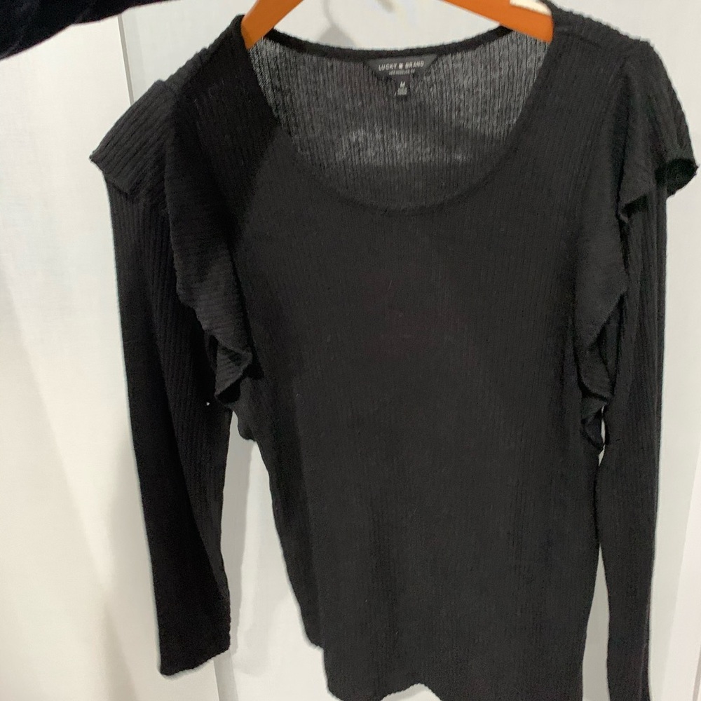 Black long sleeve. Ruffle on both shoulders. Soft.